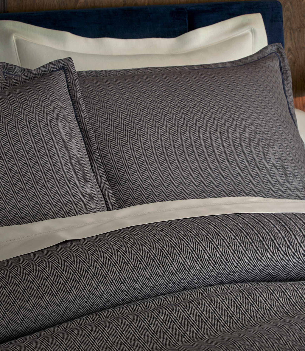 Savoy Jacquard Duvet Set in Navy styled with neutral color sheets