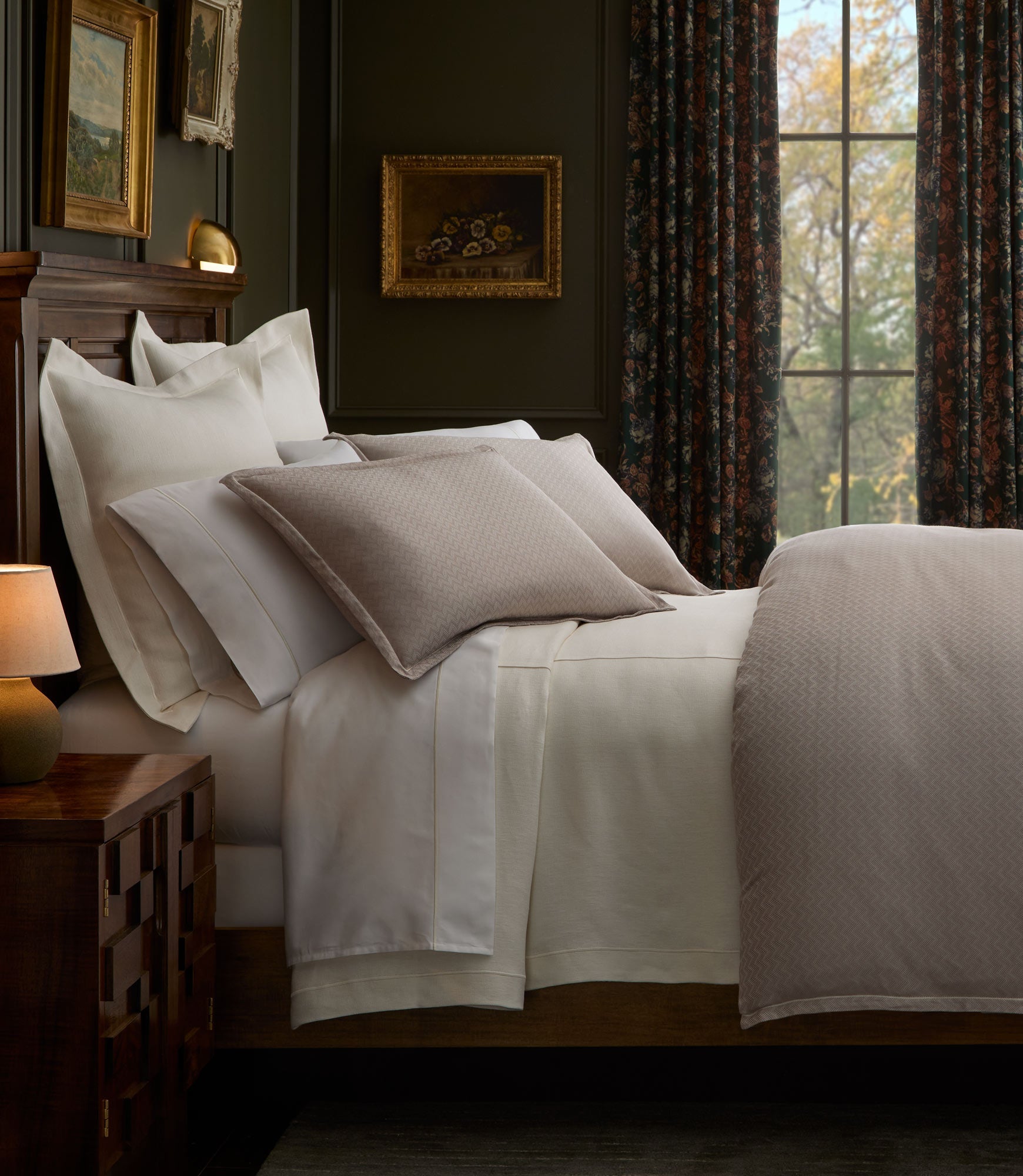 Savoy Jacquard Duvet and Shams on a bed in a moody bedroom, Platinum